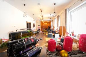 a room with a bunch of wine bottles on display at Villa Zarra in Habovka