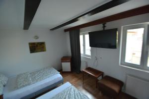 TV a/nebo společenská místnost v ubytování Gala - Guesthouse
