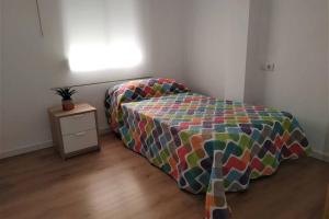 Łóżko lub łóżka w pokoju w obiekcie Aitana