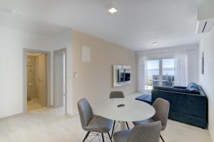 Posedenie v ubytovaní APARTMANI OLIMP1