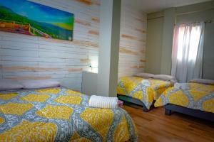 Llit o llits en una habitació de Hotel Real de Lua