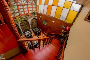 an overhead view of a staircase in a house at Hostal Chasky in Cusco