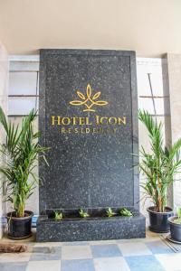 um sinal para um quarto de hotel num resort em Icon Residency em Chennai