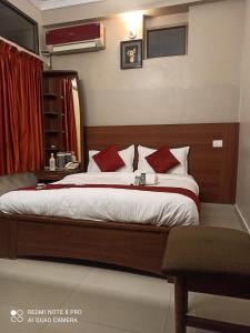 Ένα ή περισσότερα κρεβάτια σε δωμάτιο στο Hotel I-Way Residency Perungudi