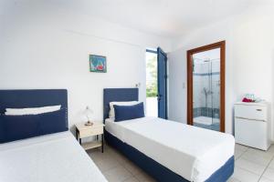 
Ένα ή περισσότερα κρεβάτια σε δωμάτιο στο Venti Seaside Adult Hotel
