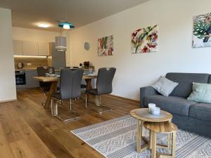 Część wypoczynkowa w obiekcie Grimmingblick Apartment 206 by AA Holiday Homes