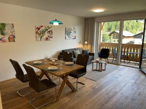 Część wypoczynkowa w obiekcie Grimmingblick Apartment 206 by AA Holiday Homes