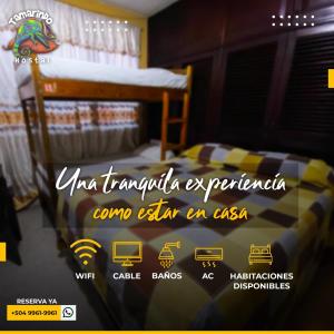 Postelja oz. postelje v sobi nastanitve Tamarindo Hostel