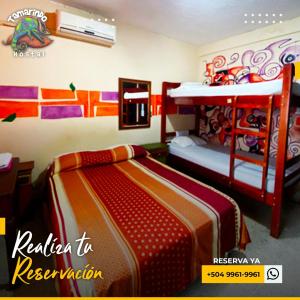 Postelja oz. postelje v sobi nastanitve Tamarindo Hostel