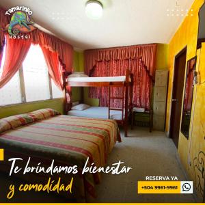 Postelja oz. postelje v sobi nastanitve Tamarindo Hostel