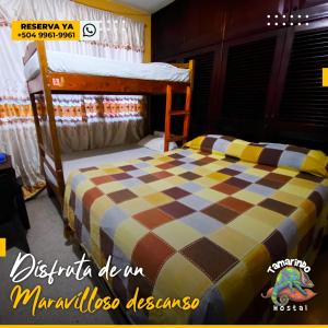Postelja oz. postelje v sobi nastanitve Tamarindo Hostel