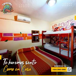 Postelja oz. postelje v sobi nastanitve Tamarindo Hostel