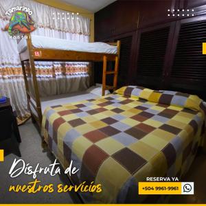 Postelja oz. postelje v sobi nastanitve Tamarindo Hostel