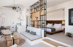 Postel nebo postele na pokoji v ubytování Athina Milos Suites
