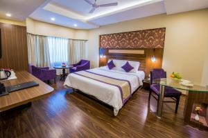 Voodi või voodid majutusasutuse Swosti Grand Bhubaneswar toas