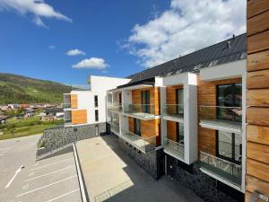 a house with a solarium on the roof at Apartmán Vila Zuberec in Zuberec