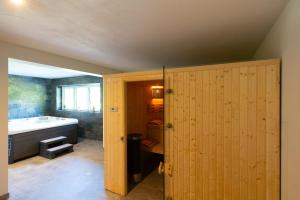 Posteľ alebo postele v izbe v ubytovaní Aparthotel Pod Stokiem z sauną i jacuzzi - szczyrkapartamenty