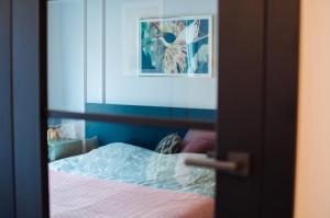 Llit o llits en una habitació de Apartament Lazuli