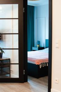 Llit o llits en una habitació de Apartament Lazuli