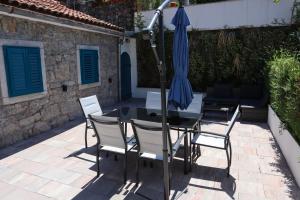 Patio alebo iná vonkajšia časť ubytovania Guesthouse Totićevi