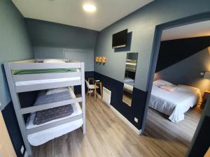 Postel nebo postele na pokoji v ubytování Hôtel-Restaurant Le Flobart