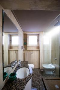 Kúpeľňa v ubytovaní Torre dei Sapiti Apartment