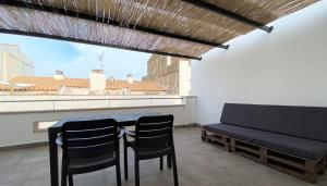 Posedenie v ubytovaní Apartaments l'Escala Centre