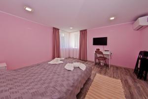 Ένα ή περισσότερα κρεβάτια σε δωμάτιο στο Guest house Stefan