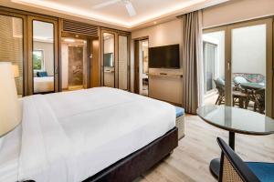Ein Bett oder Betten in einem Zimmer der Unterkunft Divan Bodrum Palmira