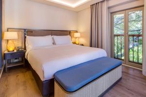 Ein Bett oder Betten in einem Zimmer der Unterkunft Divan Bodrum Palmira