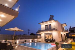 Bazén v ubytování La Vita Villas nebo v jeho okolí