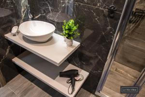 Koupelna v ubytování La Vita Villas
