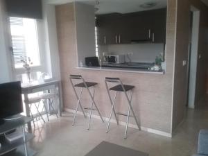 Kuchyň nebo kuchyňský kout v ubytování Albir Sunshine Apartments