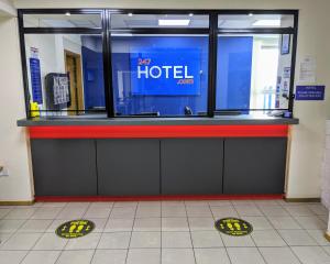 a ticket counter at a hotel in a building at 247Hotel.com in Oldham