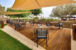 Ein Restaurant oder anderes Speiselokal in der Unterkunft Divan Bodrum Palmira 