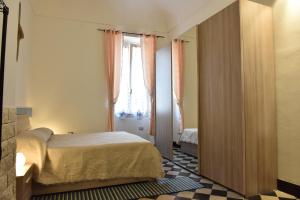 מיטה או מיטות בחדר ב-Casa Isabella Light Blue Intero Appartamento