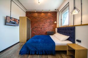 Postel nebo postele na pokoji v ubytování Secret Apartments