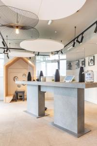 Лобби или стойка регистрации в Novotel Deauville Plage +37 фотографий
