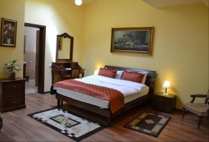 Кровать или кровати в номере Casa Republicii