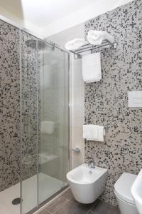 Koupelna v ubytování 4essences Boutique Rooms