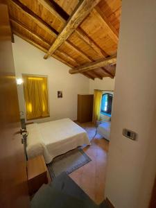 En eller flere senge i et værelse på Il noceto dell'Etna