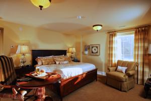 Llit o llits en una habitació de Grant Hall Hotel