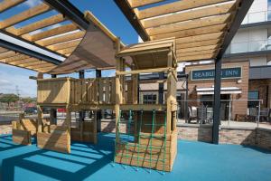 a playground in front of a building at The Seaburn Inn - The Inn Collection Group in Sunderland