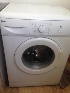 a white washer and dryer in a room at apartment 2 bedrooms in hassan in Rabat