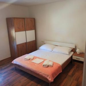 Postel nebo postele na pokoji v ubytování Modern family apartment ZARA