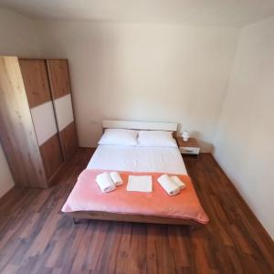 Postel nebo postele na pokoji v ubytování Modern family apartment ZARA