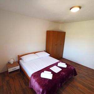 Postel nebo postele na pokoji v ubytování Modern family apartment ZARA + 14 fotografií
