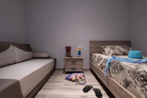 Posteľ alebo postele v izbe v ubytovaní Sunset Studios - Suites with Seaview & Back Side Apartements