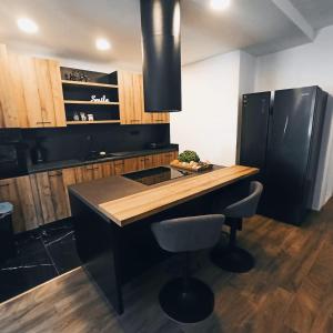 Kuchyň nebo kuchyňský kout v ubytování Modern family apartment ZARA