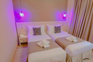 Postel nebo postele na pokoji v ubytování Savaneti Eco Hotel